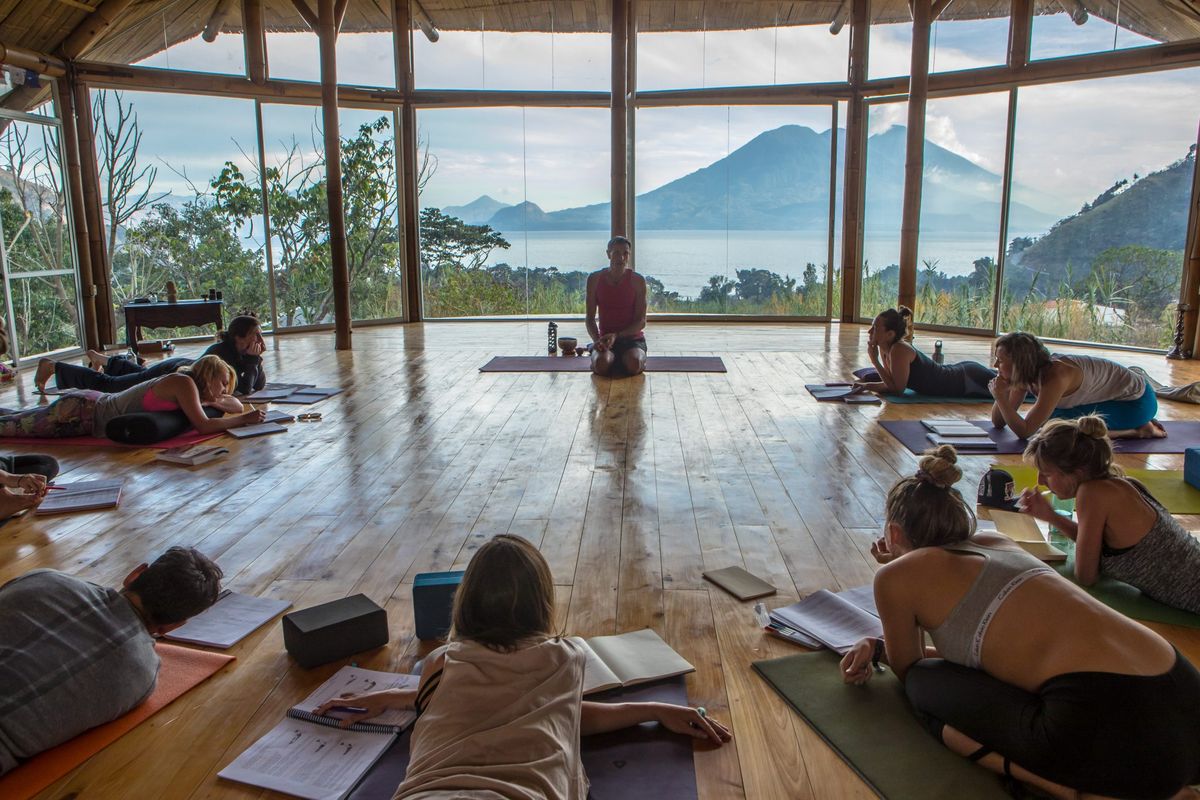 A Mysore-style room with students practicing.