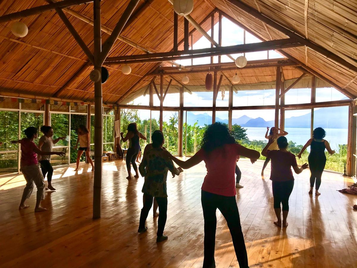 A class holding hands in a circle.