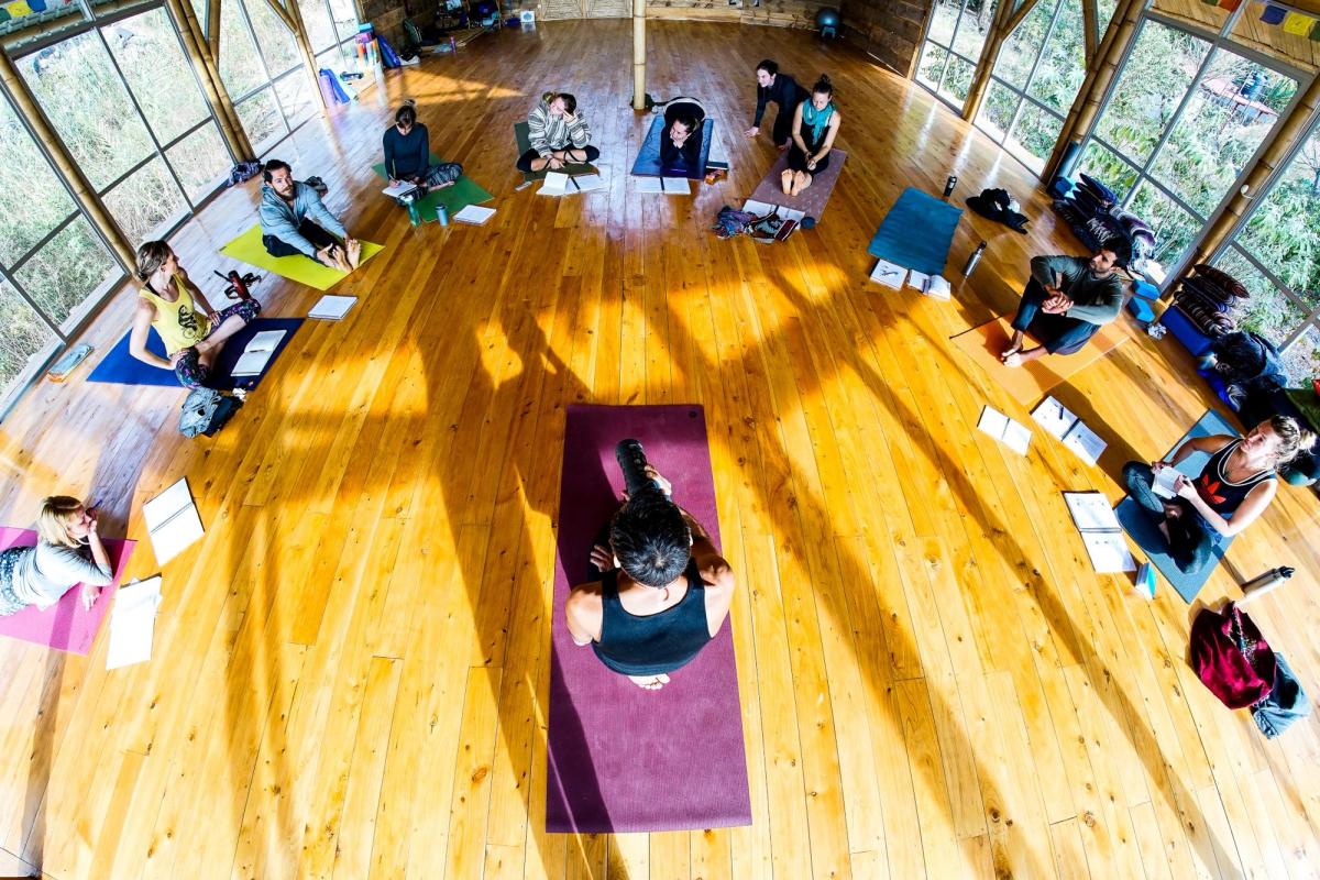 A class resting in child's pose.