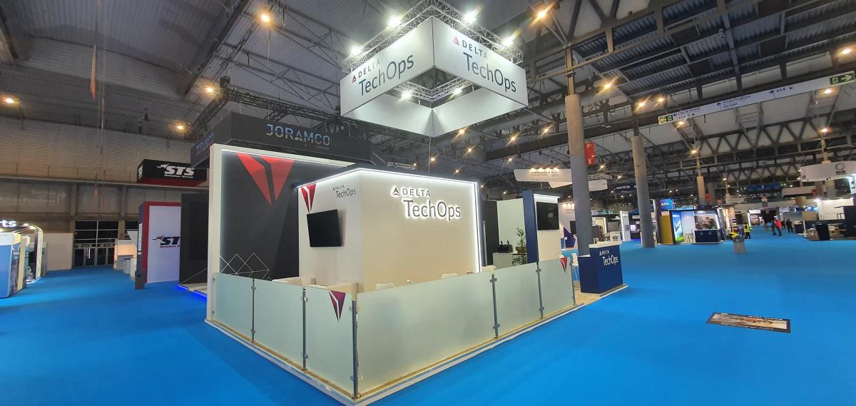 Custom MRO exhibition stand with engine maintenance and component repair service displays