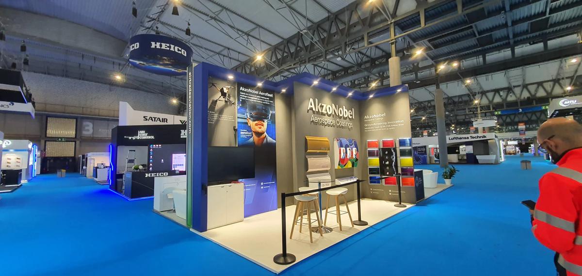 Custom MRO exhibition stand with interactive demonstration zones and meeting areas