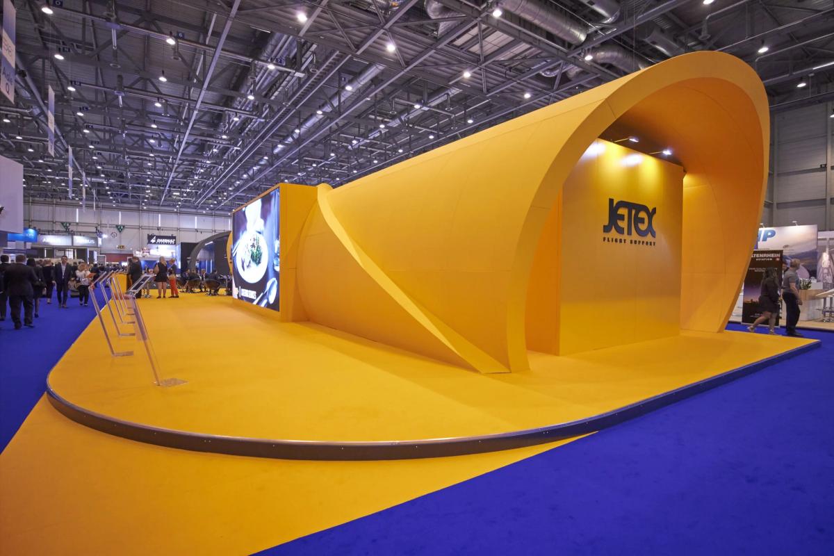 The 540 square metre Jetex stand with sculptural curved architecture at EBACE Geneva
