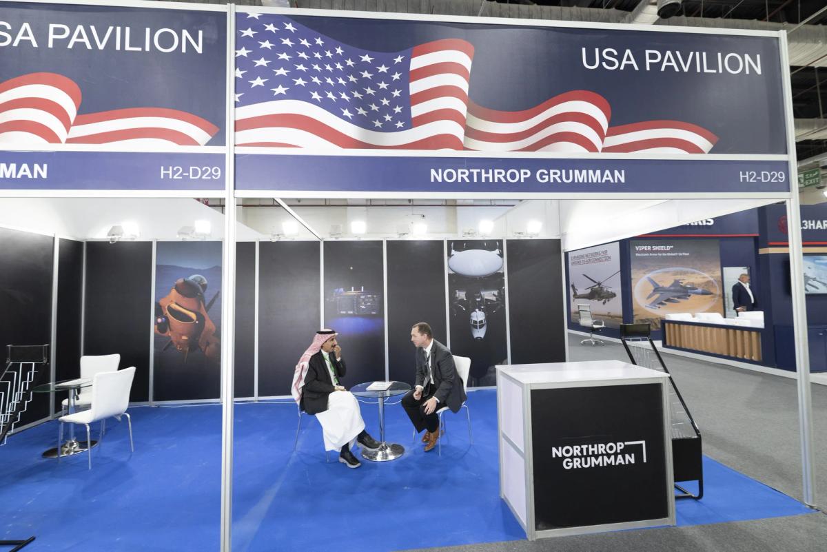 Custom defence exhibition stand architecture with product displays and presentation areas