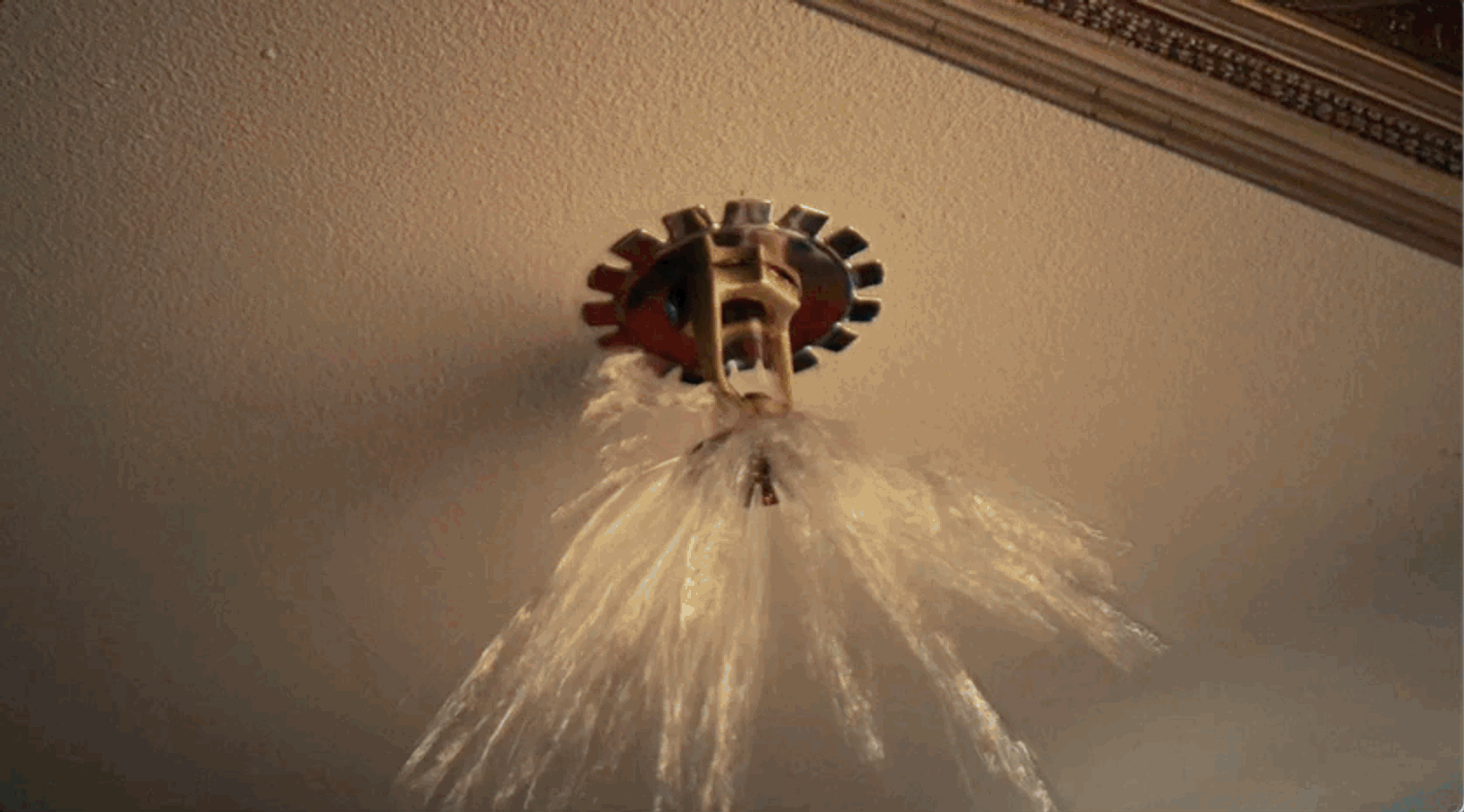 Sparks bursting from a ceiling fixture