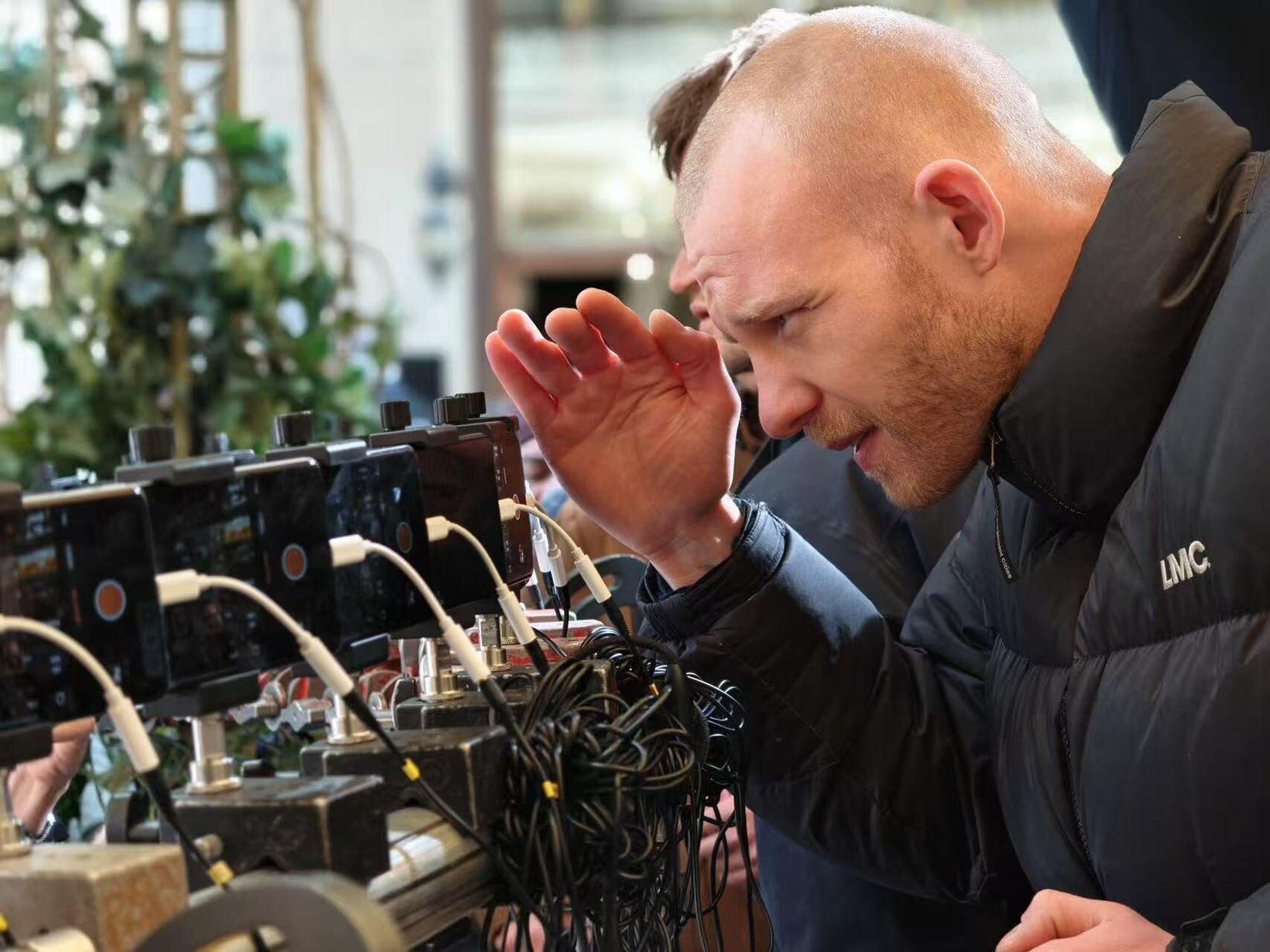 Crew member checking the phones on the bullet time rig