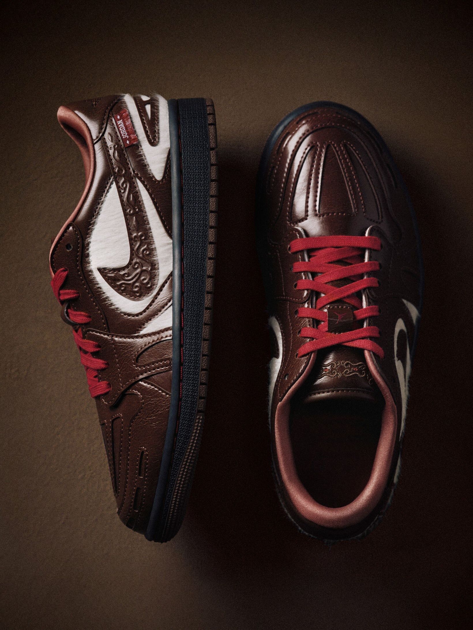 Pair of brown and red Jordan sneakers from above