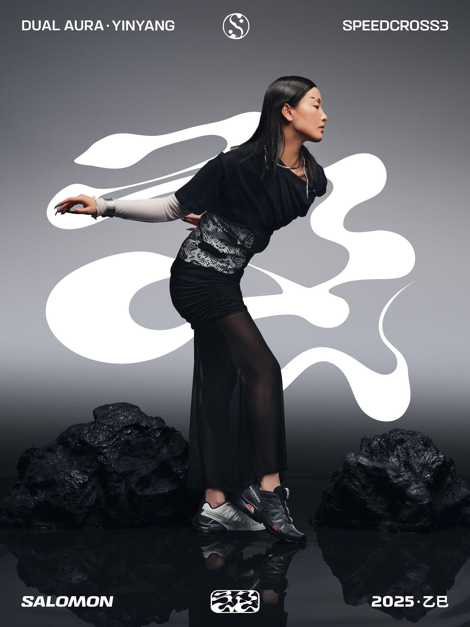 Woman posing among white calligraphic shapes in the Yin Yang key visual