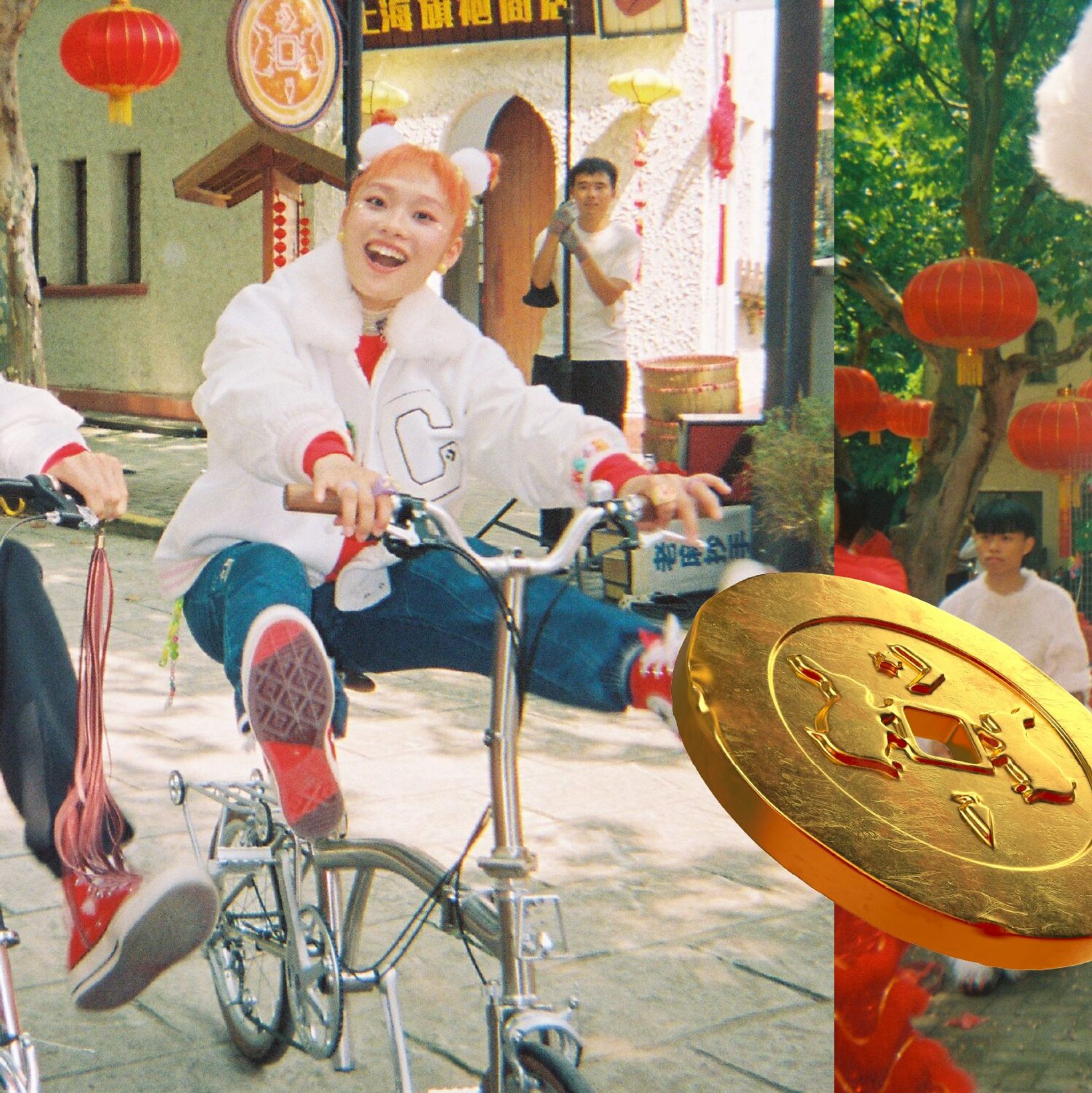 Girl with orange hair riding a bicycle past a giant gold coin under red lanterns