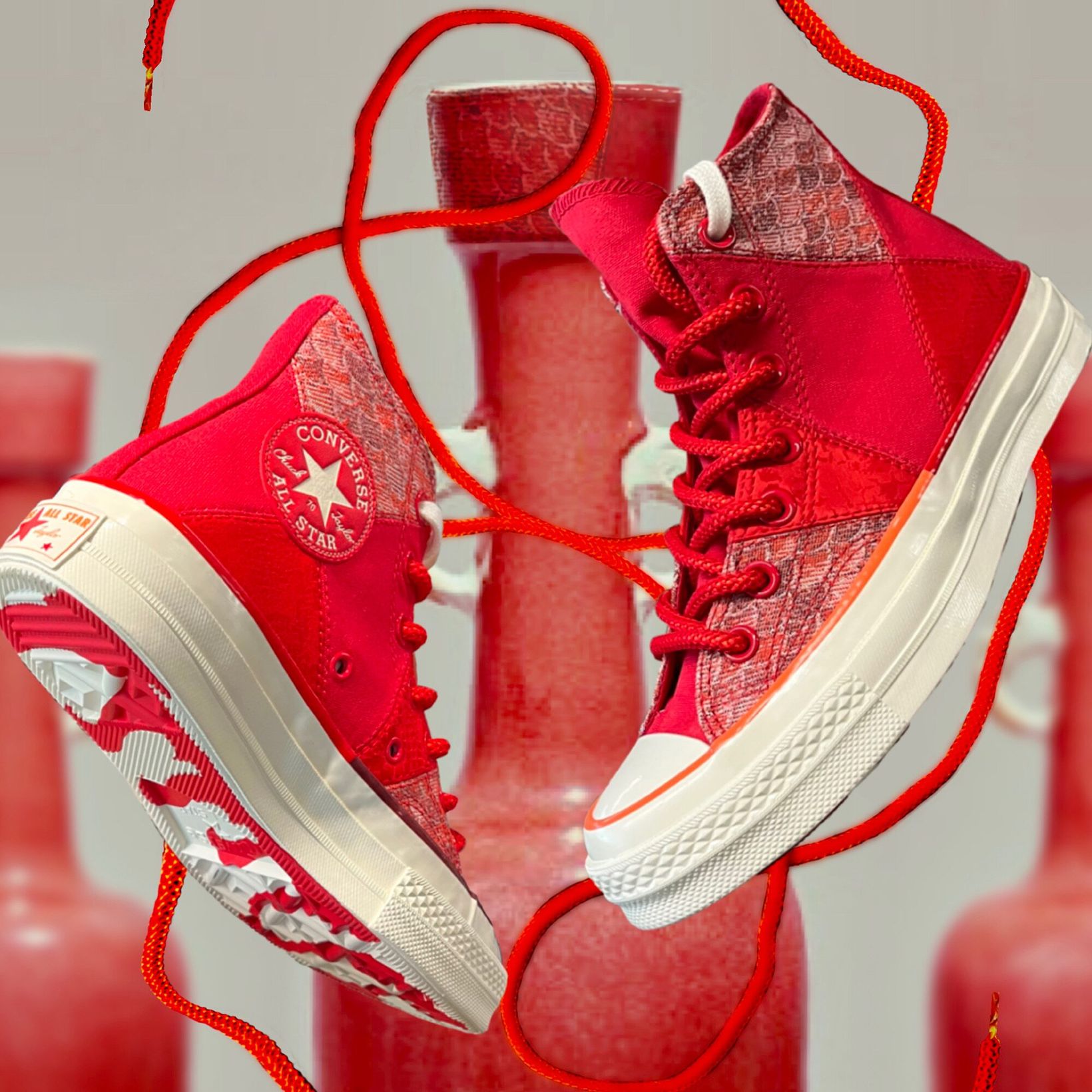 Red Converse Year of the Dragon high-tops wrapped in red laces among red vases