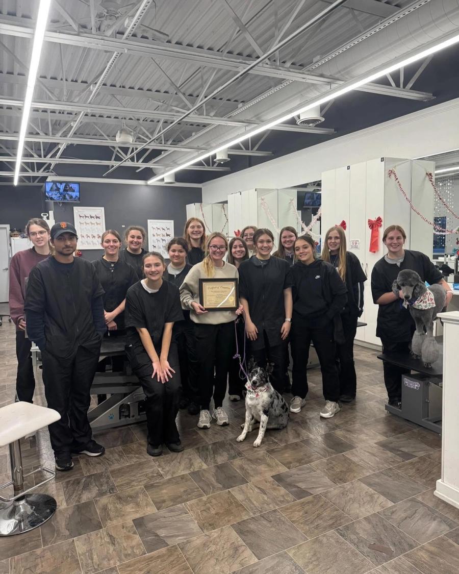 Rio Grooming School graduate with certificate