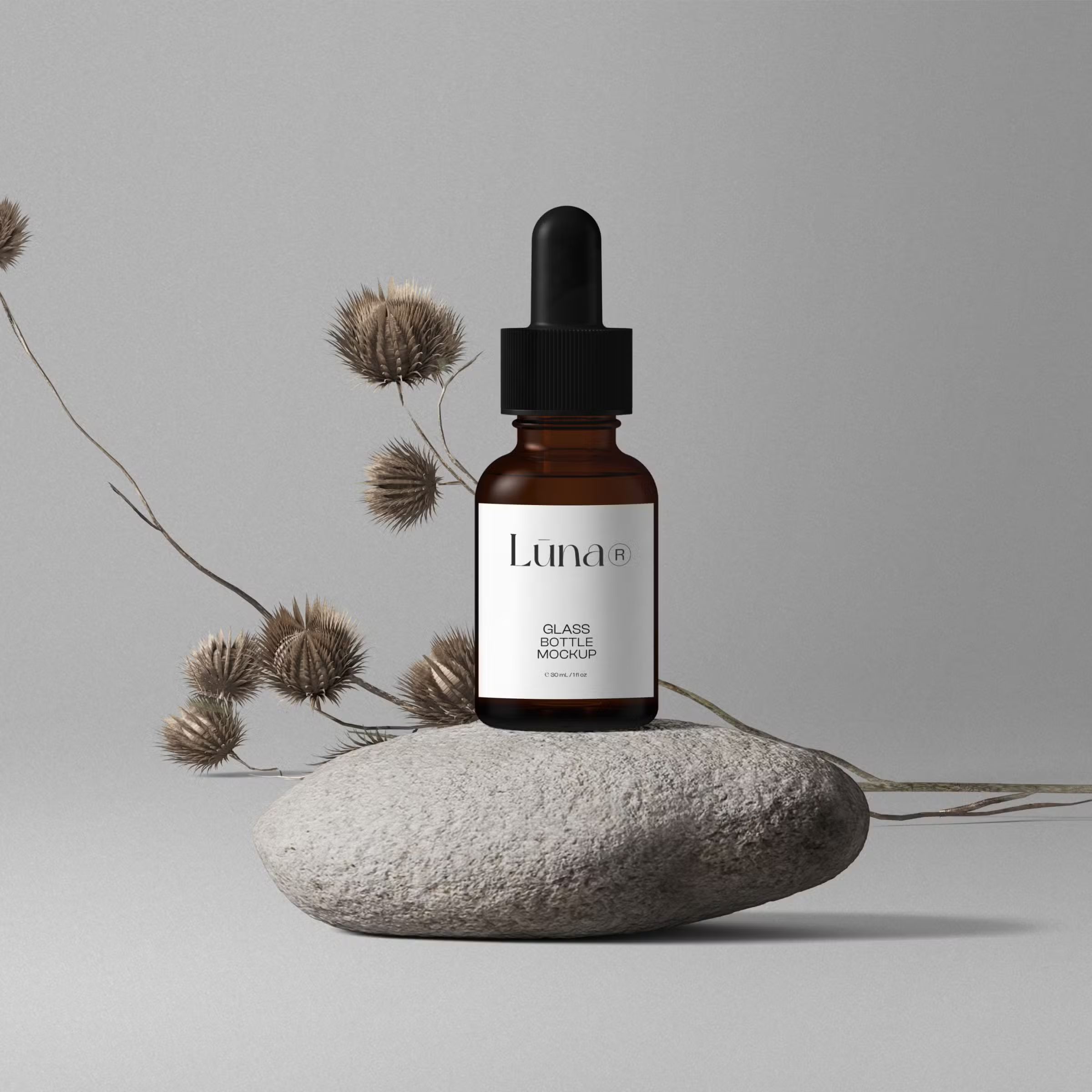 Free Cosmetic Bottle Mockups On Stones V2 Front View