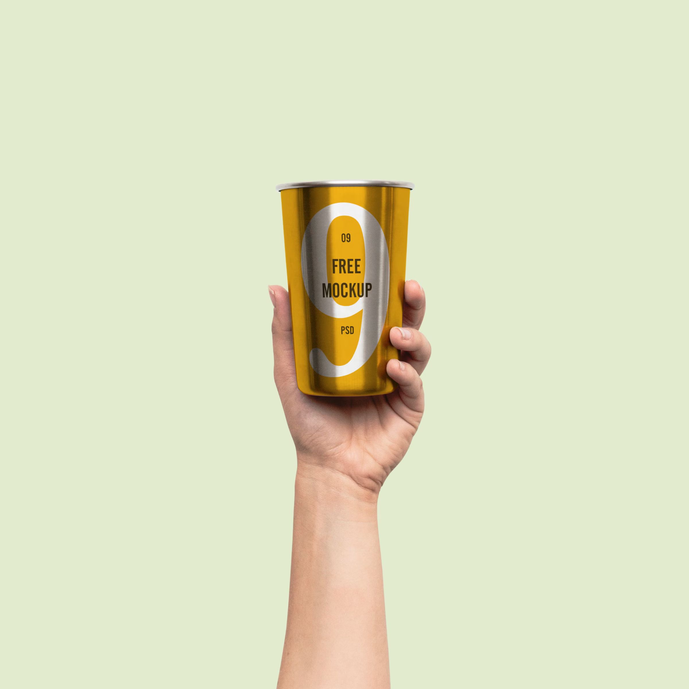 Hand Holding Metal Cup