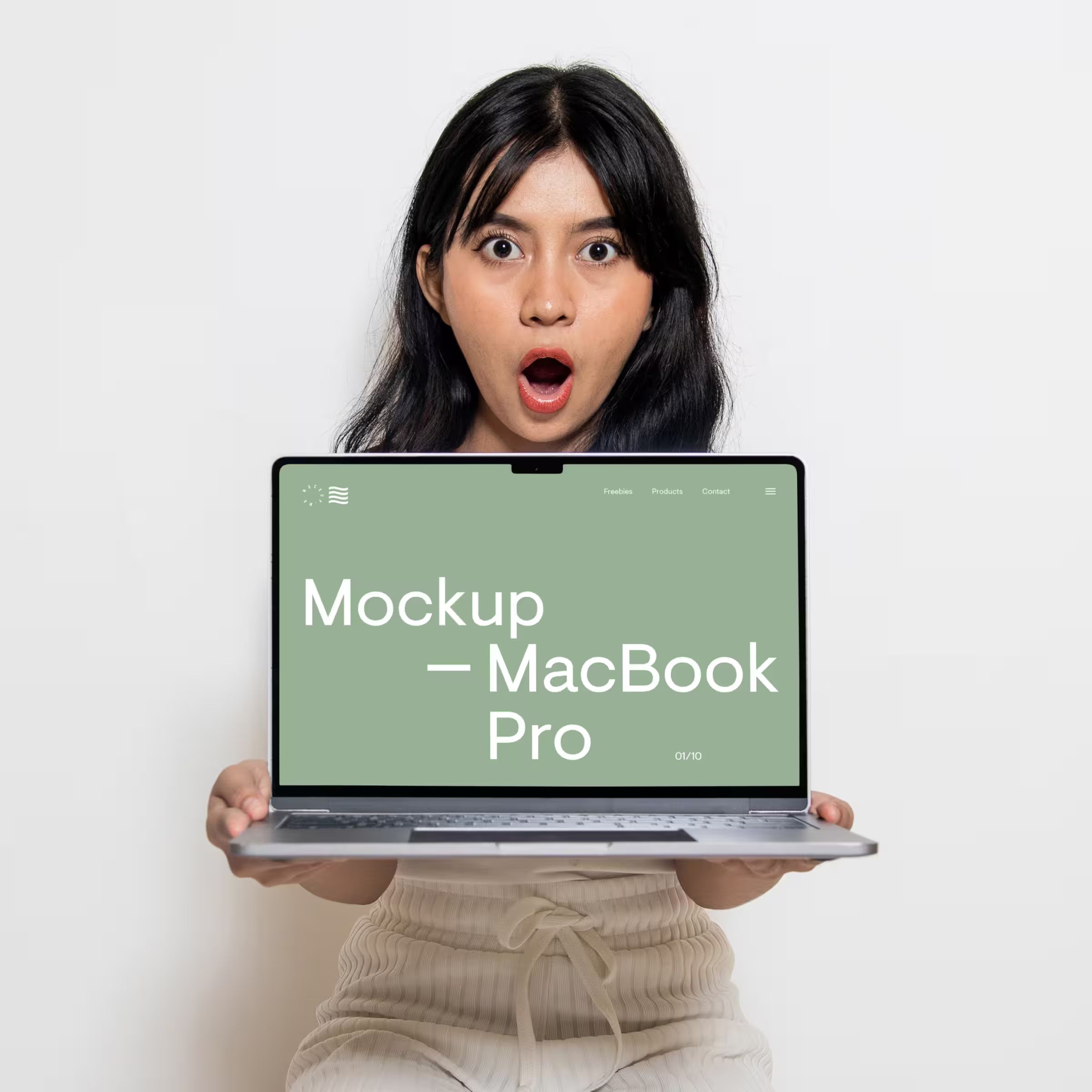 Free MacBook Pro Holding by Women Mockup