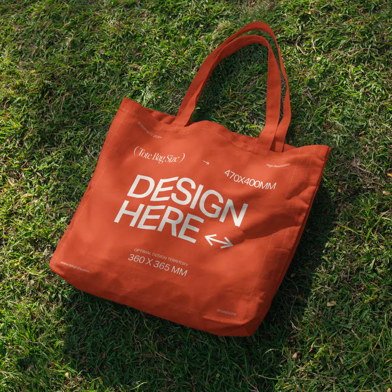 Dropped Tote Bag on Grass Mockup
