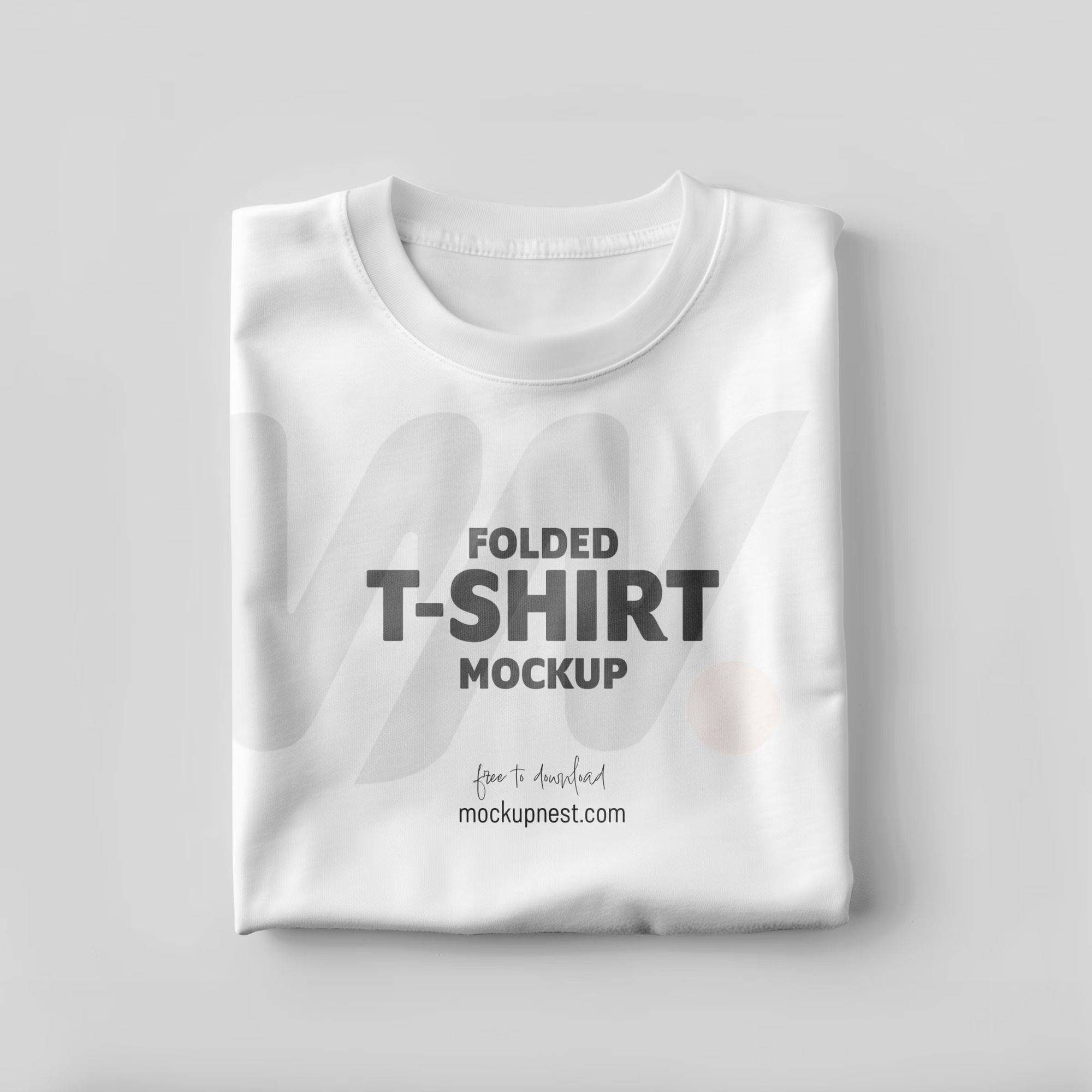 Free Folded T-Shirt Mockup