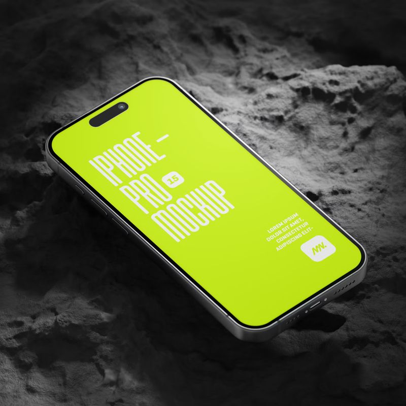 Free iPhone 15 Pro On Rock Mockup 3