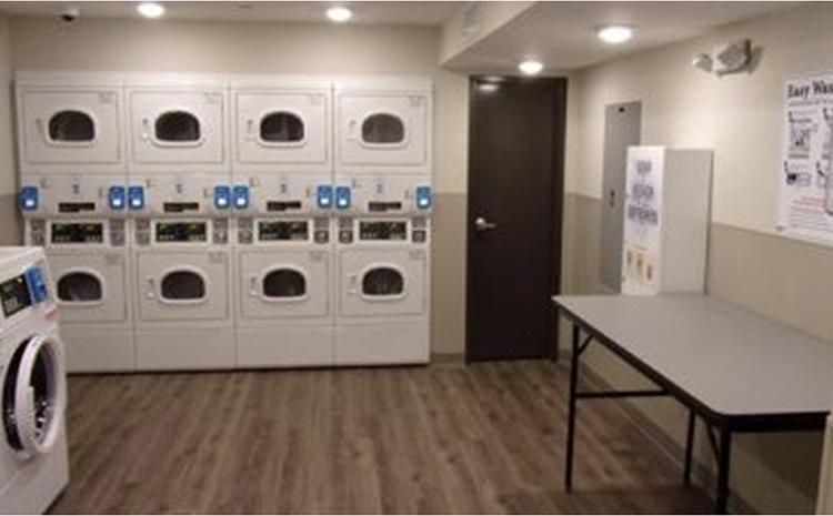 Guest laundry room at the WoodSpring Suites hotel in Norco, CA.