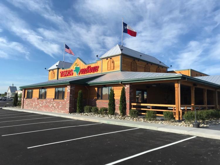 Exterior view of the front door of Texas Roadhouse in Millsboro, DE.