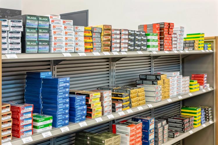 Ammunition display shelving at Next Level Ranges.
