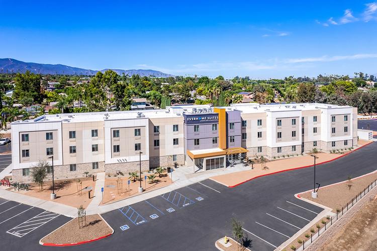 Exterior view of Everhome Suites hotel in Corona, CA.