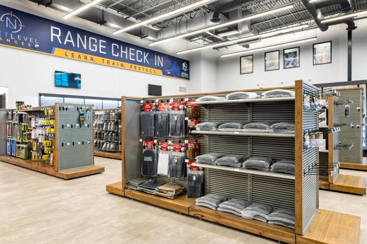 Retail merchandise fixtures inside Next Level Ranges.