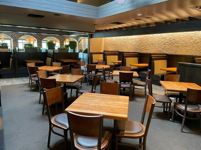 Tabletop and booth seating in the dining room of Cheddar's Scratch Kitchen in Cleveland, TN.