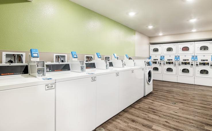 Guest laundry in the WoodSpring Suites hotel in Bellflower, CA.