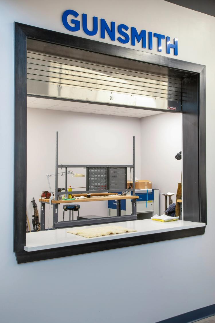 Gunsmith service window at Next Level Ranges.