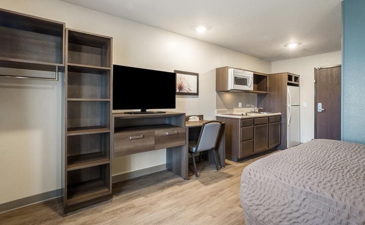 Single bedroom option in the WoodSpring Suites hotel in Bellflower, CA.