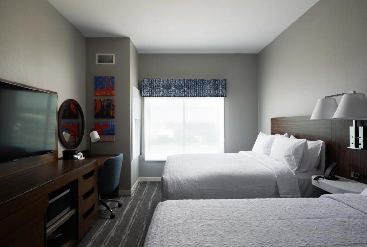 Double bed guestroom in Hampton Inn and Suites in Louisville, KY.