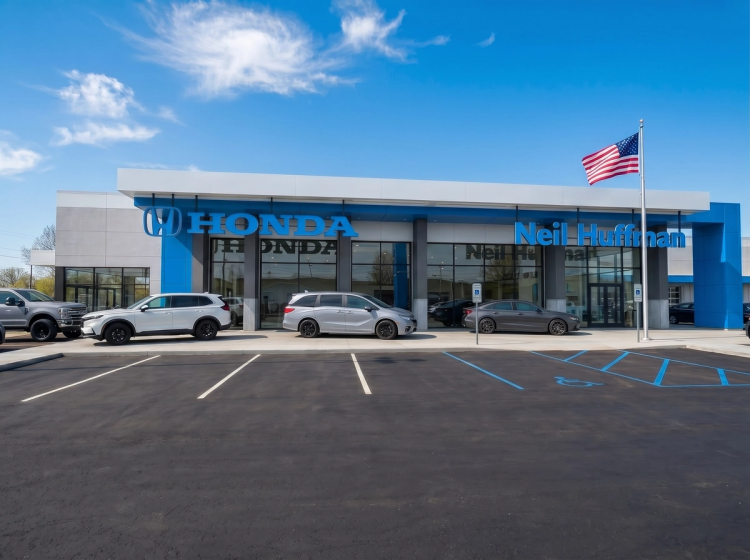 Finished photo of outside of renovated Honda Clarksville Dealership with blue sky