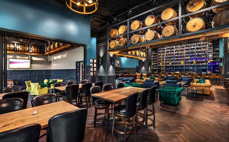 Table seating and lounge area at Watch Hill Proper.