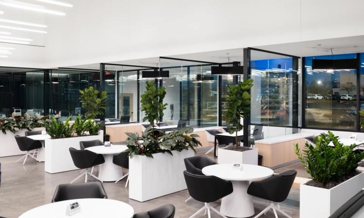 Glass consultation offices with modern desks.