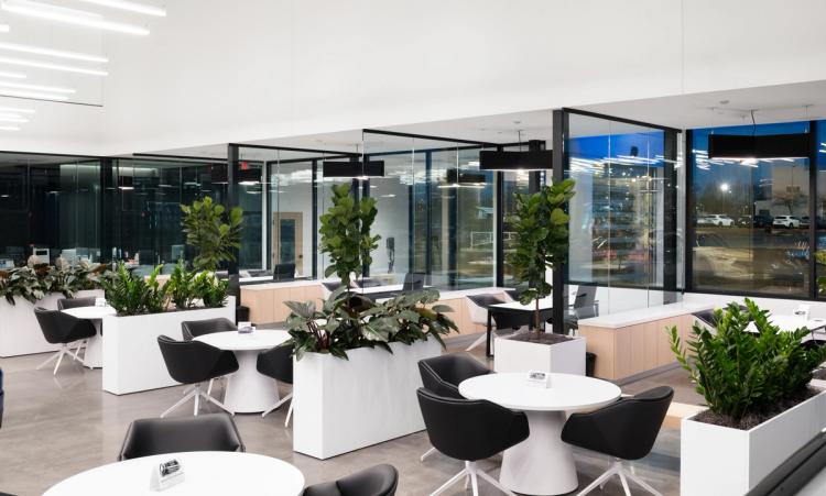 Glass consultation offices with modern desks.
