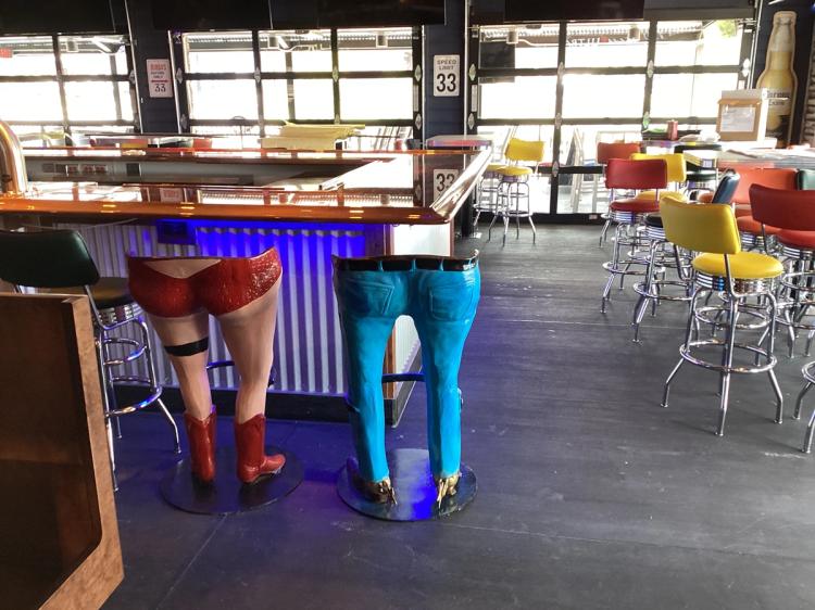 Bar and tabletop seating at Bubba's 33 restaurant in Buford, GA.