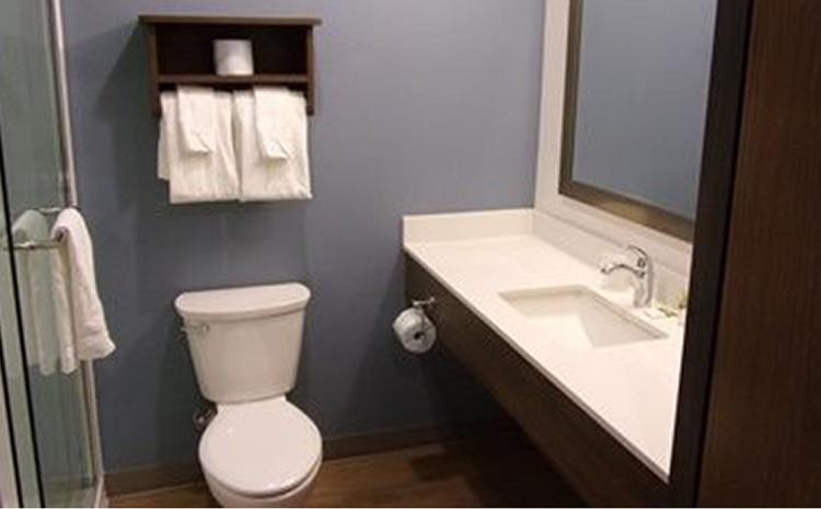Guest bathroom at the WoodSpring Suites hotel in Norco, CA.