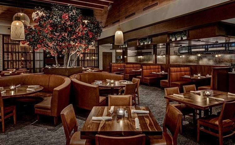 Booth seating in dining area at the 52 Seasons restaurant in San Antonio, TX.