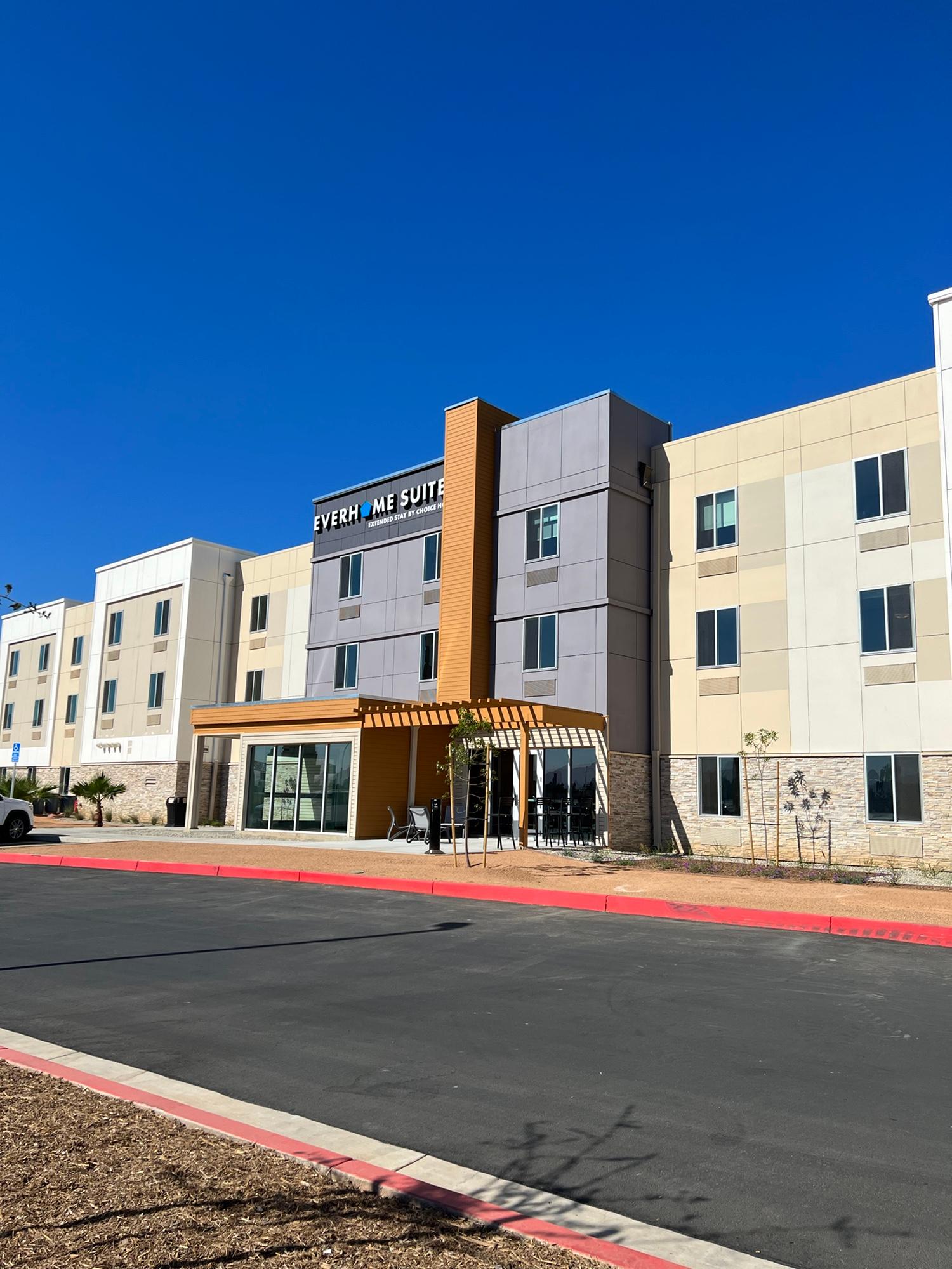 Exterior view of Everhome Suites hotel in Corona, CA.