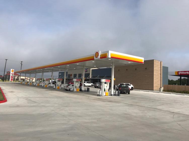 Exterior view of the Victron Fuel food mart and gas pumps.