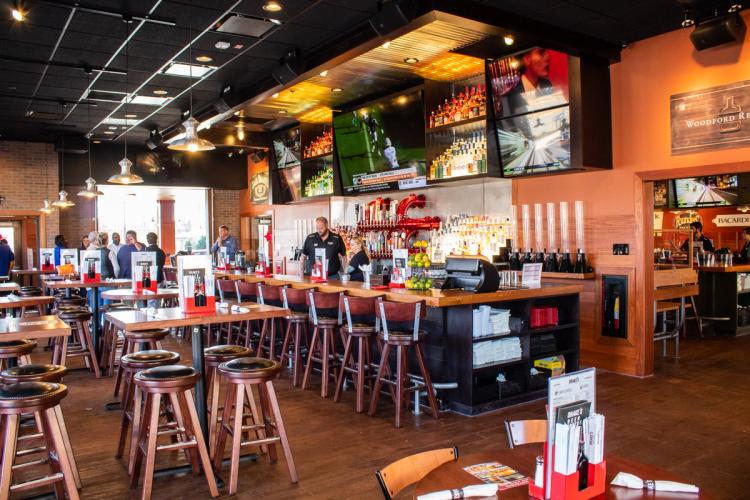 Bar and seating inside of Drake's restaurant in Lexington, KY.