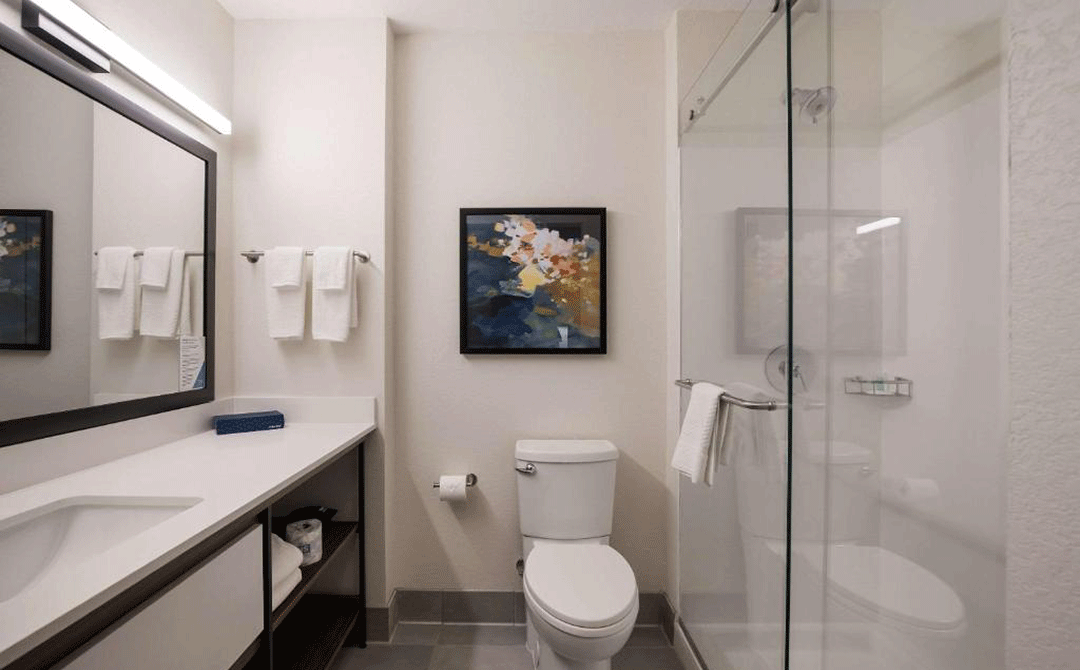 Guest room bathroom in Everhome Suites hotel in Corona, CA.