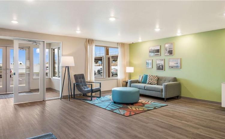 Lobby and lounge area at the WoodSpring Suites hotel in Missoula, MT.