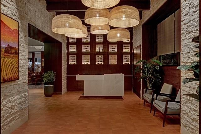 Host desk and lobby of the Seasons 52 restaurant in San Antonio, TX.