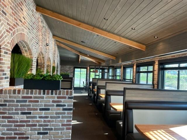Booth seating inside of Cheddar's Scratch Kitchen in Cleveland, TN.