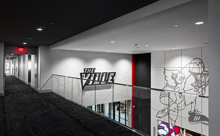 Interior hallway with balcony in Denny Crum Hall.