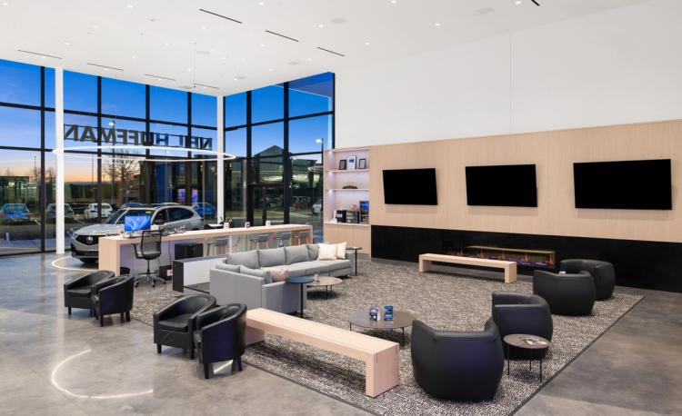 Acura showroom lounge with fireplace.