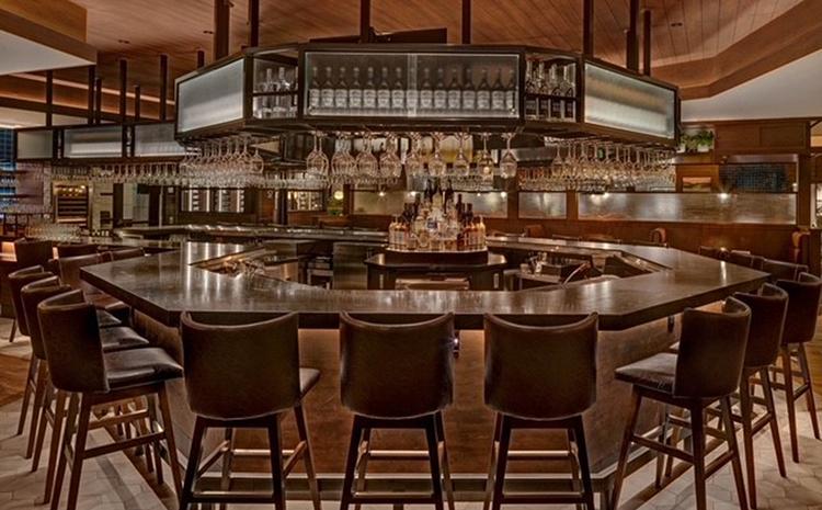 View of the bar inside the 52 Seasons restaurant in San Antonio, TX.