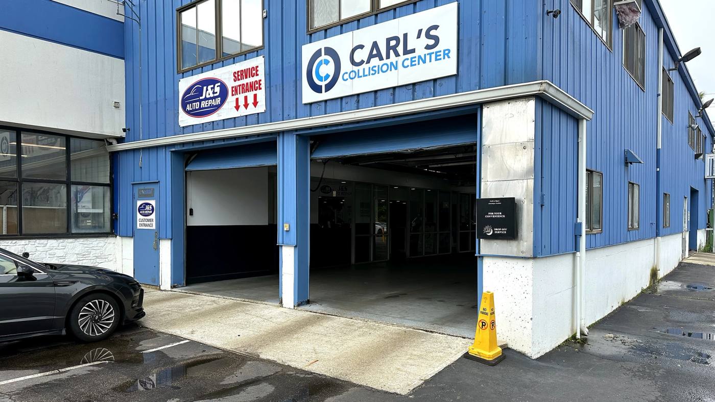 Carl's Collision Center in Newport, Rhode Island, service entrance and signage