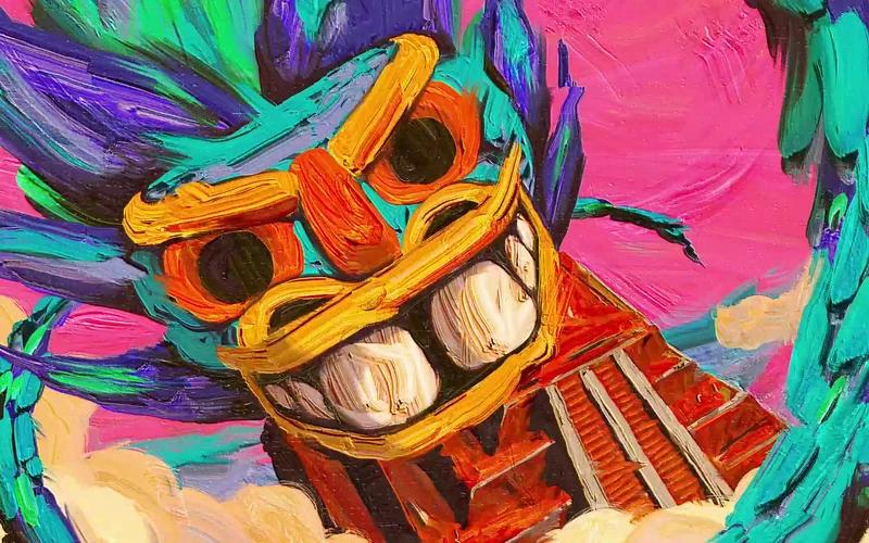 A brightly coloured Mexican mask surrounded by vivid painted textures.