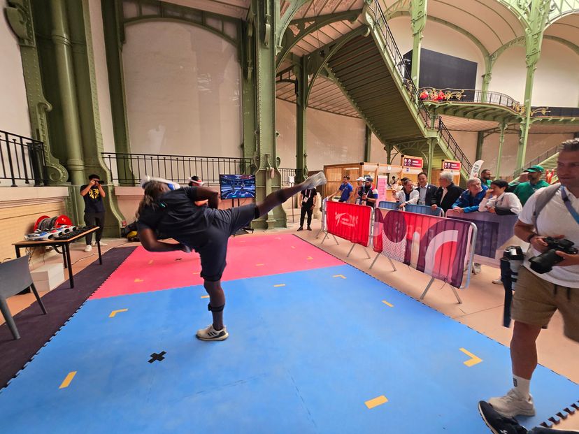 Participants doing a back kick